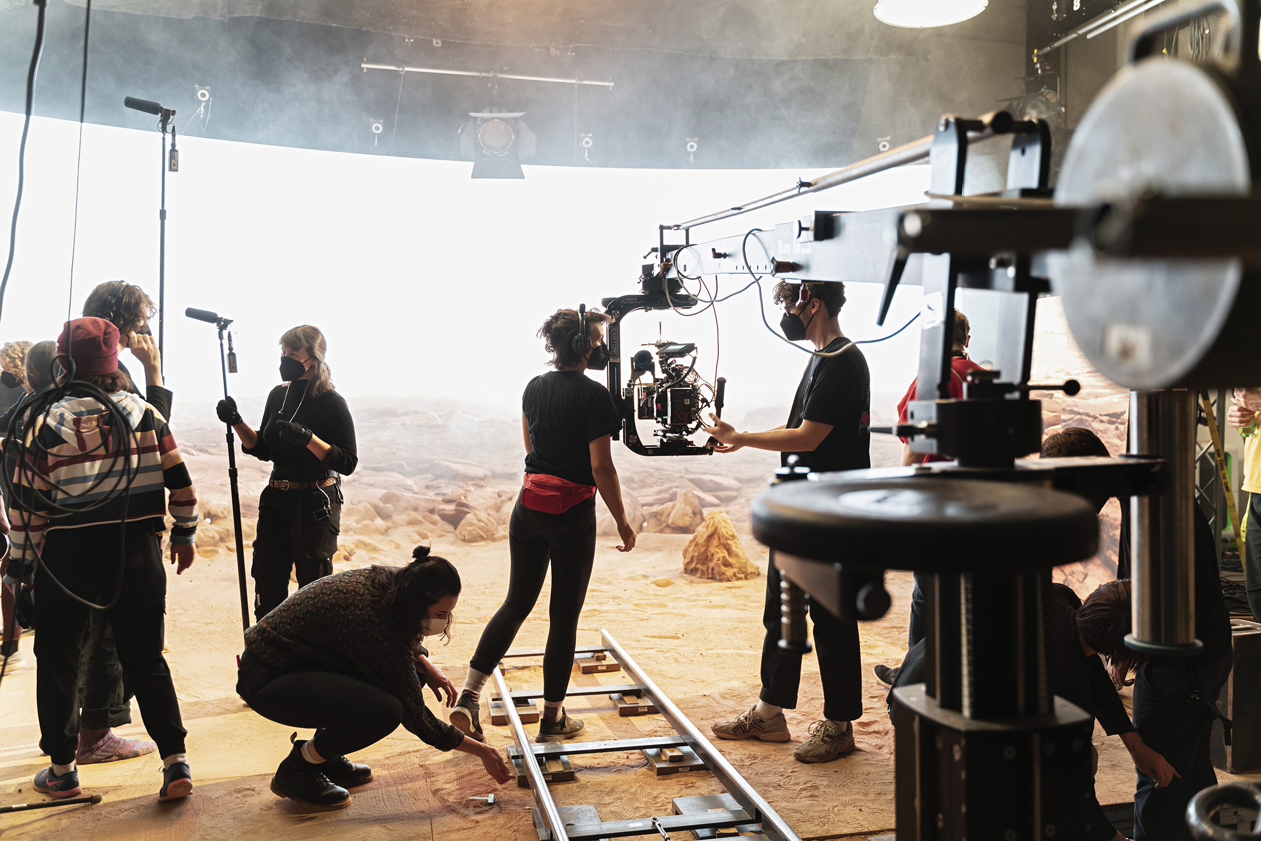 crew at filmset with camera and equipment