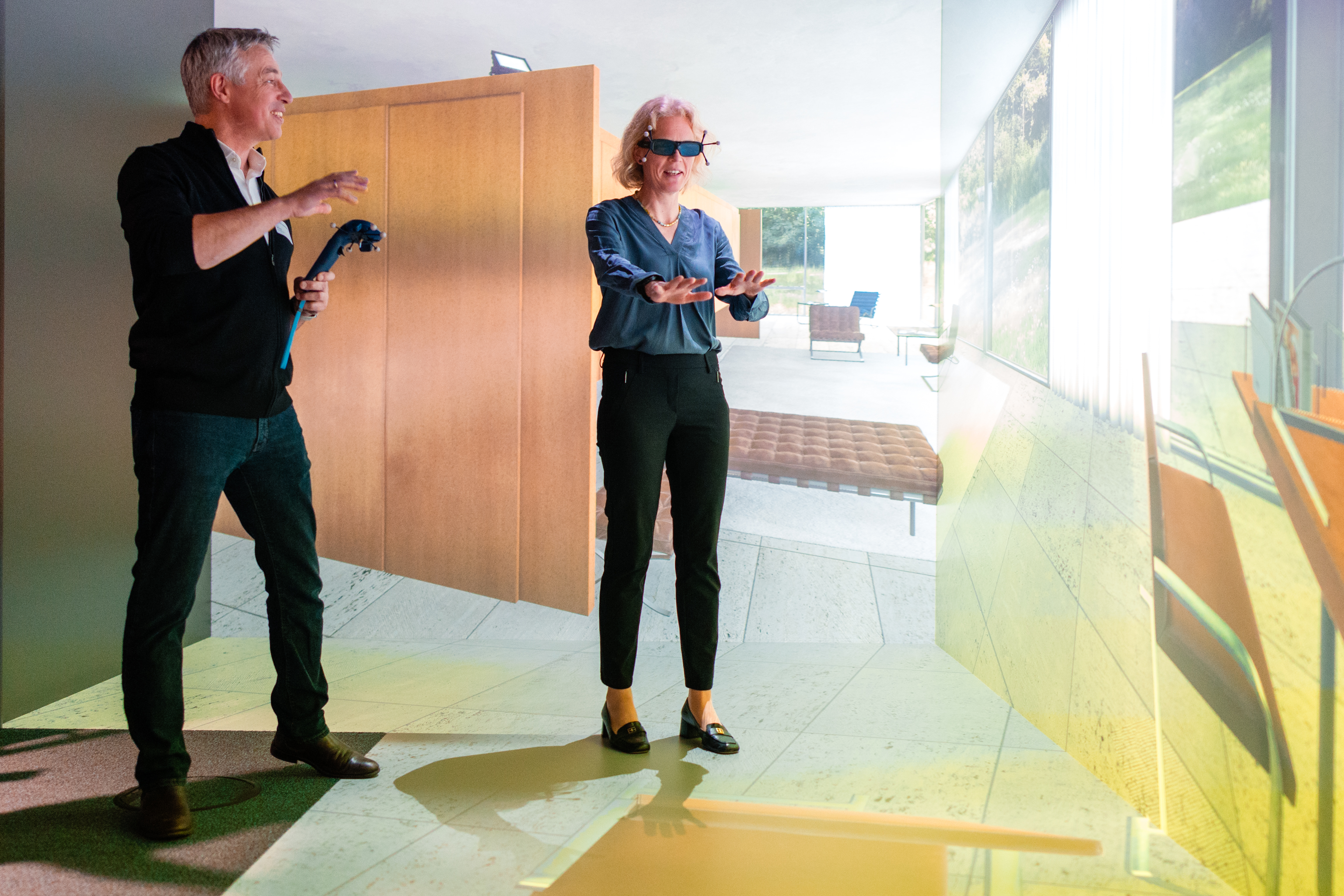 Two people working with VR glasses