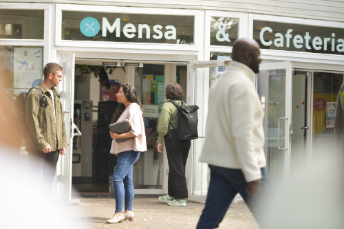 Students in front of mensa building